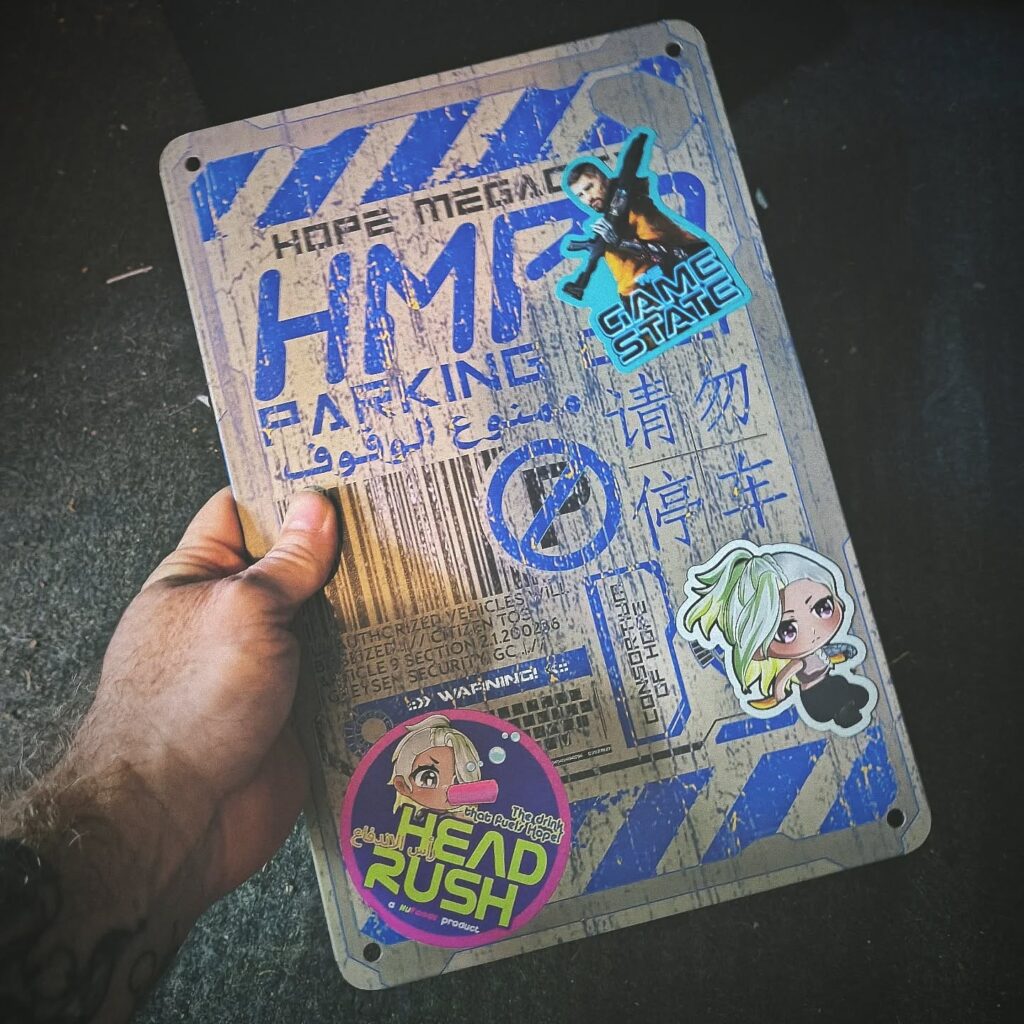 Designed this metal Hope Megacity no parking sign for general wall hanging...but also as a slick way to display your favorite cyberpunk stickers and magnets!

Shown with the brand new "Jack drinking HeadRush" sticker, Jakob's book launch sticker, and the Chibi Jack magnet! 

#cyberpunk #author #cyberpunkart #cyberpunkdesign #cyberpunkfanart #intothebeanstalk