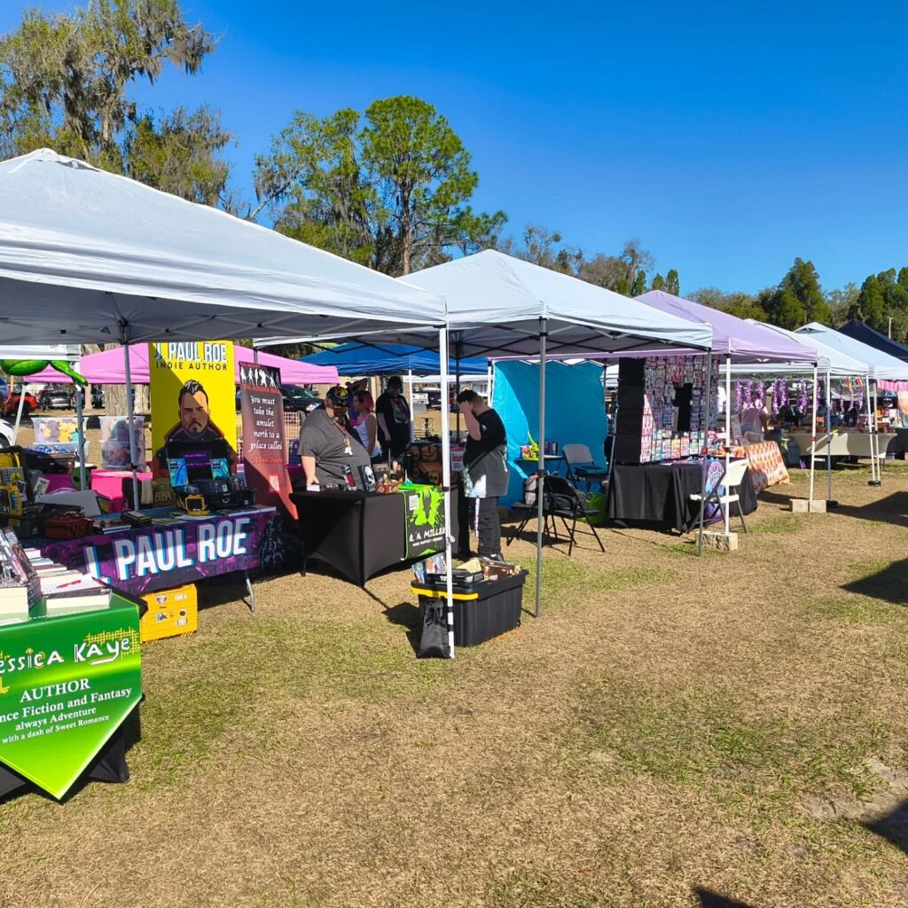 All set up at #syfybartow at Mosaic Park! Come by and get books and zines (and a bunch of cheap board games) #indieauthor